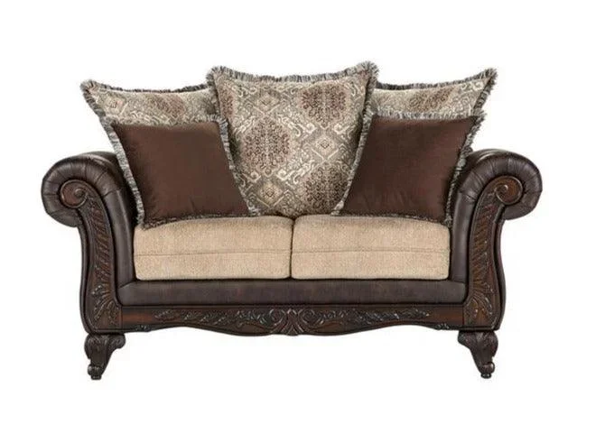 Elmbrook Brown Upholstered Rolled Arm Loveseat with Intricate Wood Carvings