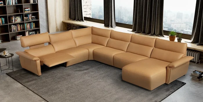 Rinconera de diseño con chaiselongue modelo PUGLIA con cabezal eléctrico ajustable y asiento relax en Piel.